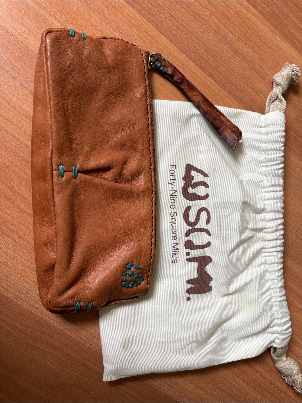 49 Square Miles Tan Leather Wristlet with Turquoise Accent